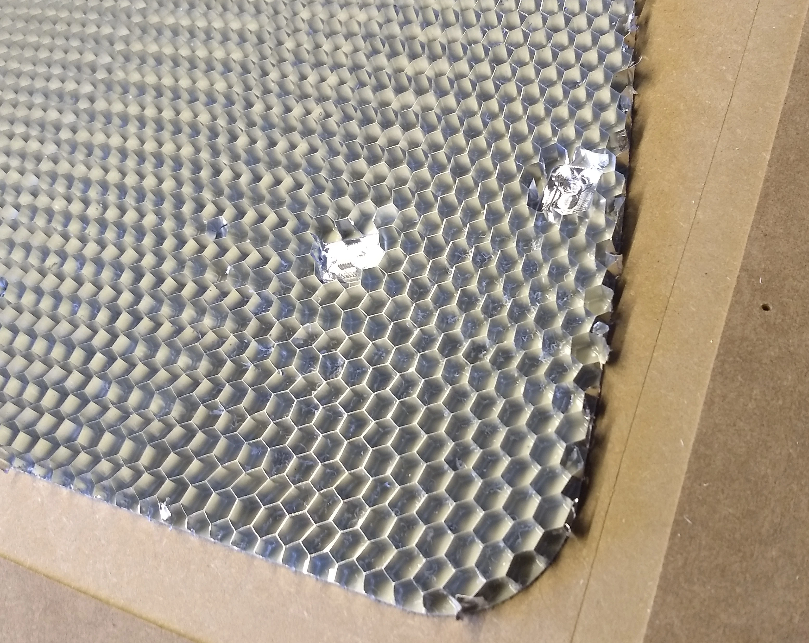 gefräste Tasche zur Aufnahme eines Einlegeteils